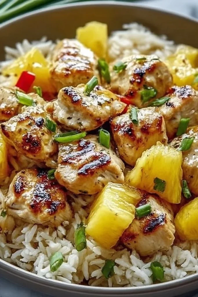 Delicious Pineapple Chicken and Rice dish served with vibrant vegetables